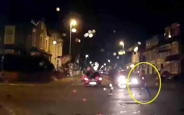 Shocker: Woman Seeking Compensation Caught Running Towards a Moving Taxi and Jumping On Its Bonnet (Video)